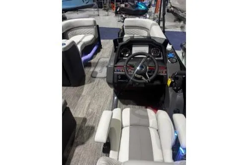 Slide: The Image of 2026 Godfrey Monaco 255 MTF boat interior with modern dashboard and seating. - 4