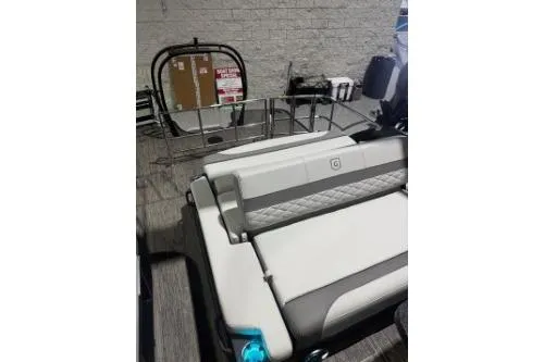 Slide: The Image of 2026 Godfrey Monaco 255 MTF pontoon boat interior with modern seating design. - 5