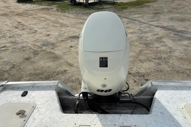 Slide: The Image of 2009 Kenner 19VX boat with Suzuki 90 outboard motor, viewed from above. - 33