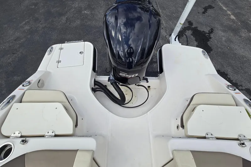 Slide: The Image of 2019 Chaparral 230 Suncoast boat stern with Yamaha outboard motor. - 15