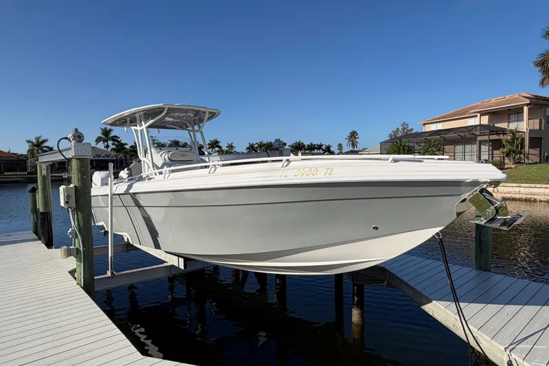 The Image of 2022 Glasstream 328 Pro-XS boat docked on a sunny day. - 0