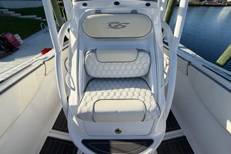 Slide: The Image of 2022 Glasstream 328 Pro-XS boat with white cushioned seating and sleek design. - 27