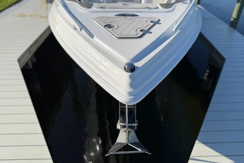 Slide: The Image of 2022 Glasstream 328 Pro-XS boat docked, showcasing sleek bow design. - 32