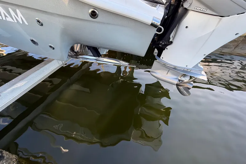 Slide: The Image of 2022 Glasstream 328 Pro-XS boat engine and propeller in water. - 39