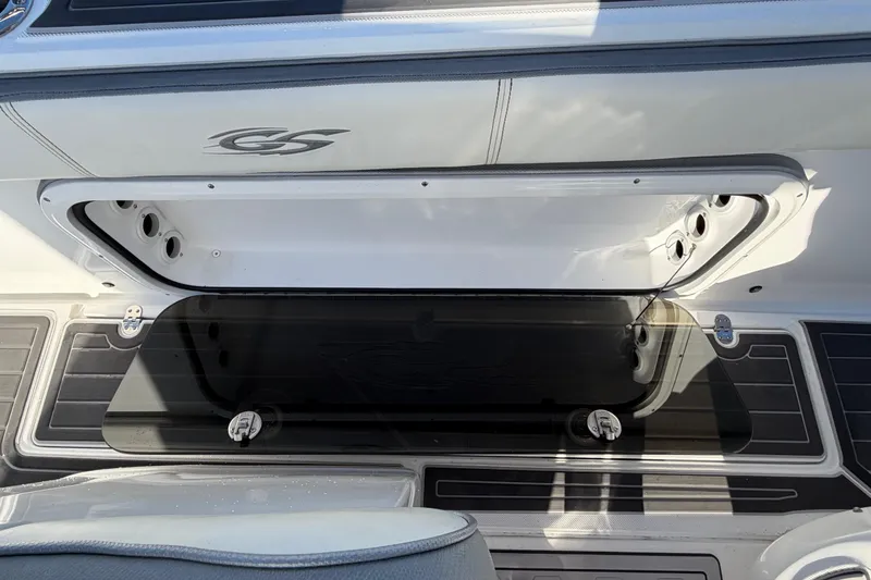 Slide: The Image of 2022 Glasstream 328 Pro-XS boat interior with storage compartment and sleek design. - 43