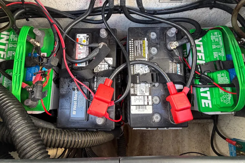 Slide: The Image of Batteries and wiring in a 2022 Glasstream 328 Pro-XS boat. - 47