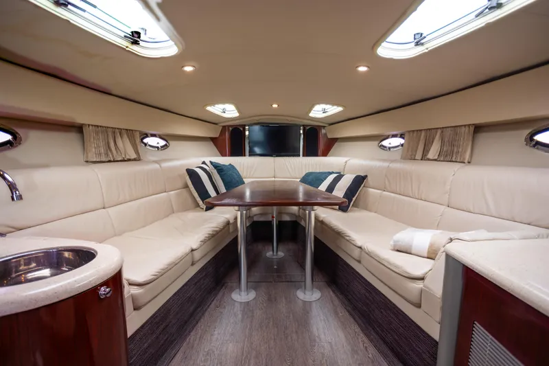 Slide: The Image of Luxurious interior of 2005 Formula 400 Super Sport yacht with plush seating and elegant decor. - 15