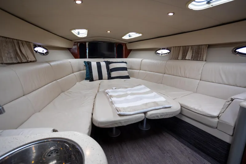 Slide: The Image of Luxurious interior of a 2005 Formula 400 Super Sport yacht with plush seating and modern design. - 16