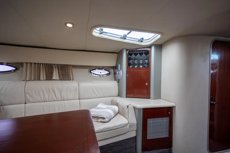 Slide: The Image of Luxurious interior of a 2005 Formula 400 Super Sport yacht with plush seating and elegant wood finishes. - 17