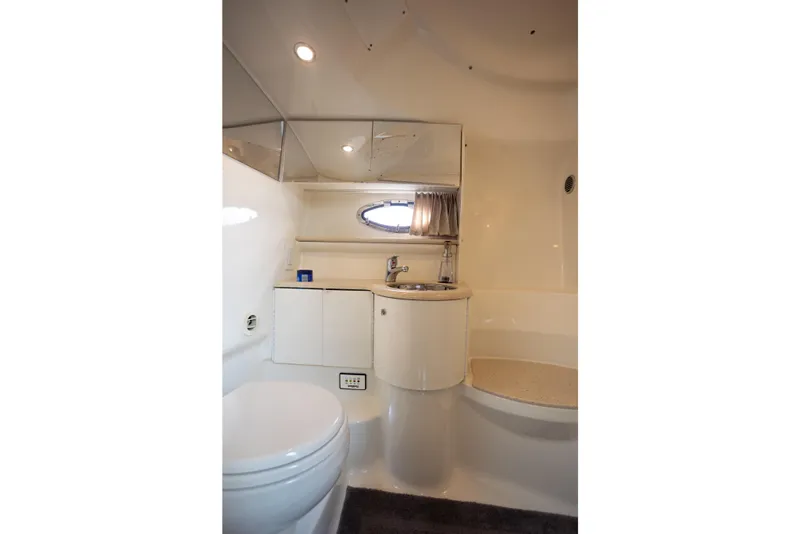 Slide: The Image of 2005 Formula 400 Super Sport yacht bathroom with modern fixtures and compact design. - 18