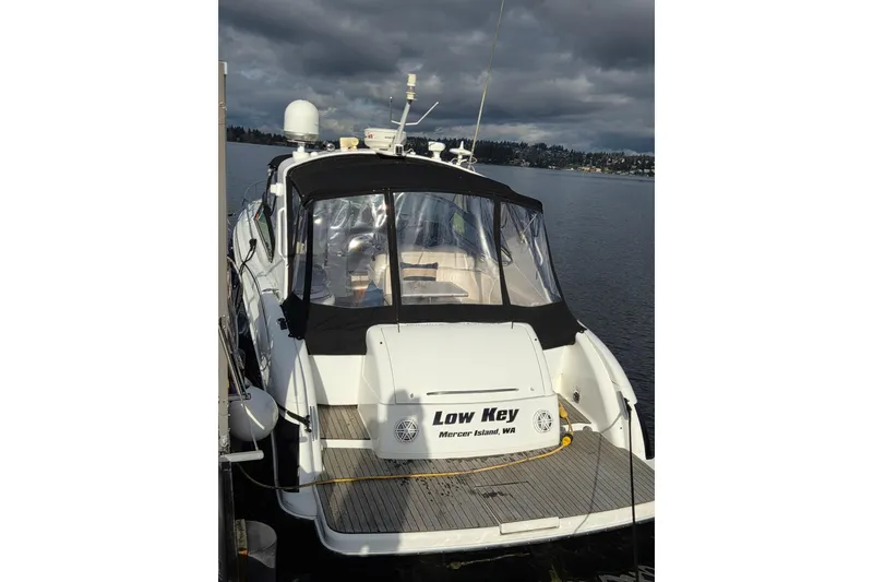 Slide: The Image of 2005 Formula 400 Super Sport boat docked on a cloudy day. - 20