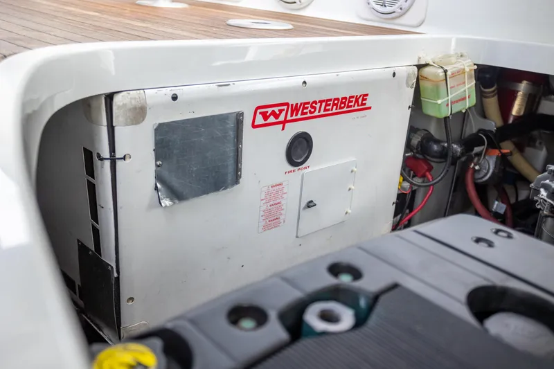 Slide: The Image of Westerbeke generator in 2005 Formula 400 Super Sport boat engine compartment. - 23