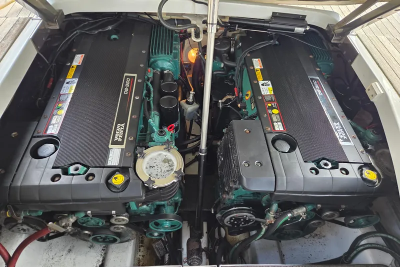 Slide: The Image of Engine compartment of a 2005 Formula 400 Super Sport boat, featuring dual Volvo Penta engines. - 24