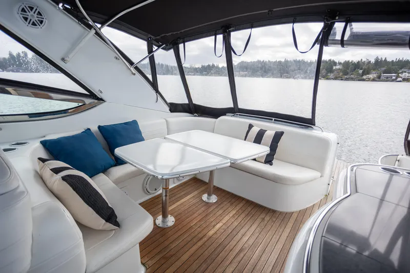 Slide: The Image of Luxurious 2005 Formula 400 Super Sport yacht interior with elegant seating and scenic water view. - 3