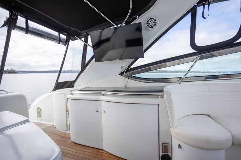 Slide: The Image of Interior of 2005 Formula 400 Super Sport yacht with seating and mounted TV. - 4