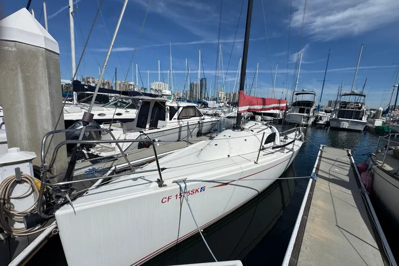 The Image of Sailboat Flying Tiger 10M 2007 docked in a marina under a clear blue sky. - 0