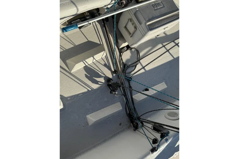 Slide: The Image of Interior view of a 2007 Flying Tiger 10M sailboat, showcasing rigging and equipment. - 10