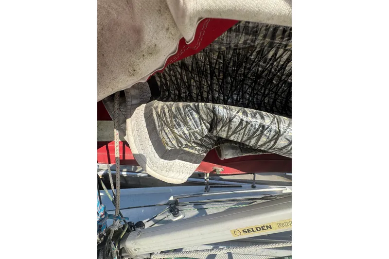 Slide: The Image of Close-up of a Flying Tiger 10M sailboat's sail and rigging, featuring Selden hardware. - 14