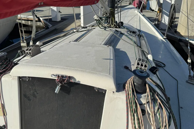 Slide: The Image of Deck of a 2007 Flying Tiger 10M sailboat with rigging and winches. - 4