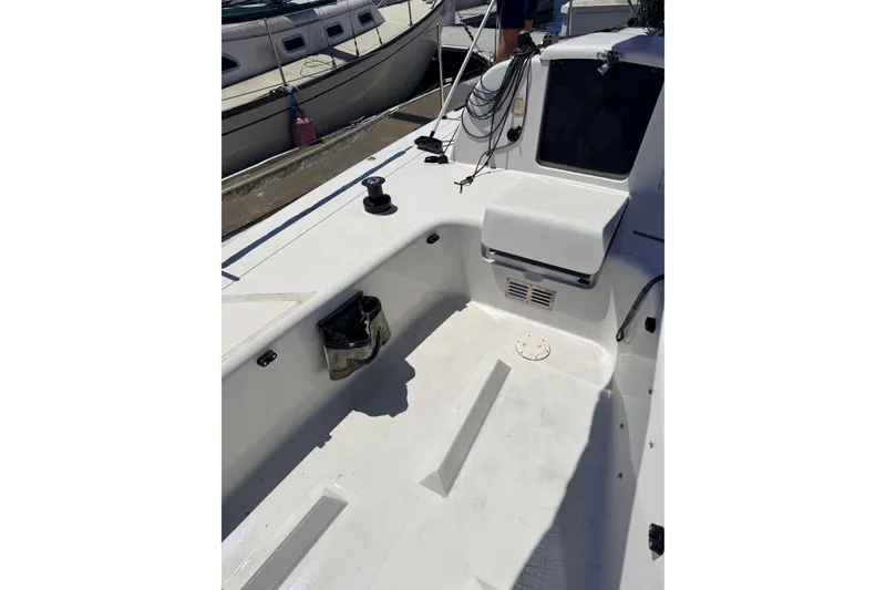 Slide: The Image of Cockpit of a 2007 Flying Tiger 10M sailboat, featuring winches and seating. - 45