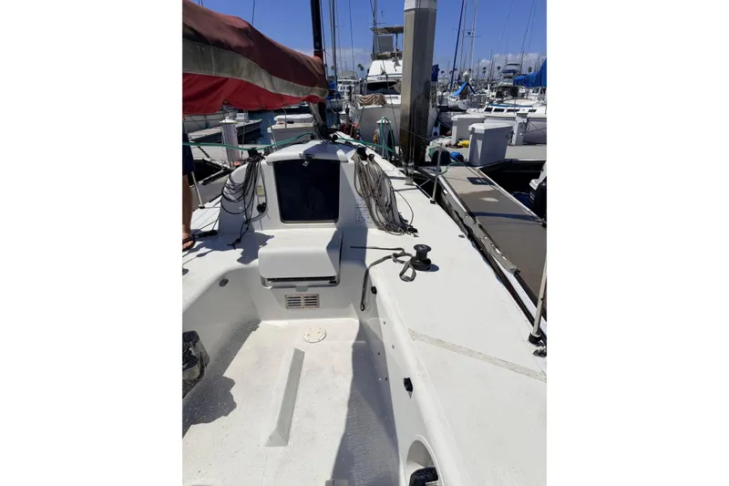 Slide: The Image of Sailboat docked at marina, Flying Tiger 10M, 2007 model, with visible cockpit and rigging. - 46