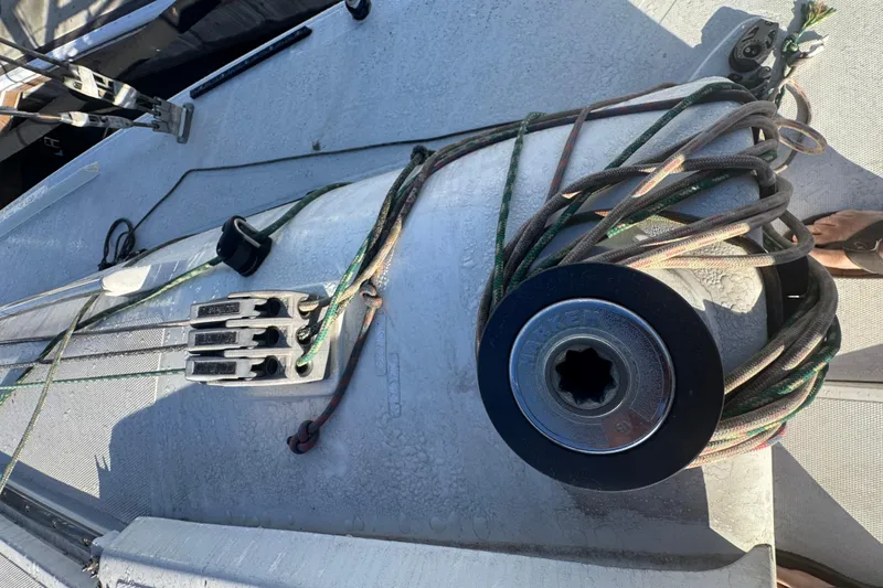 Slide: The Image of Deck of 2007 Flying Tiger 10M sailboat with ropes and winch. - 5