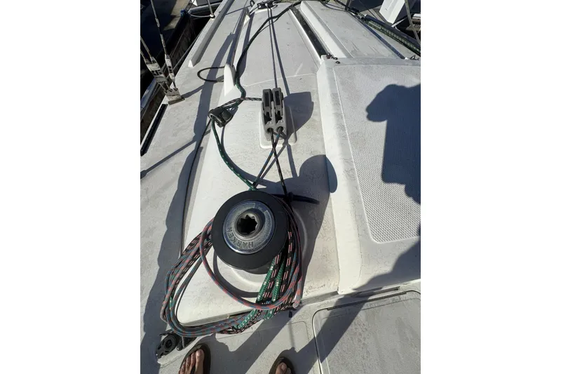Slide: The Image of Deck of 2007 Flying Tiger 10M sailboat with winch and ropes. - 6