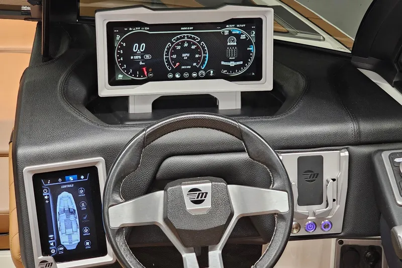 Slide: The Image of 2023 Malibu M220 dashboard with digital displays and steering wheel controls. - 3