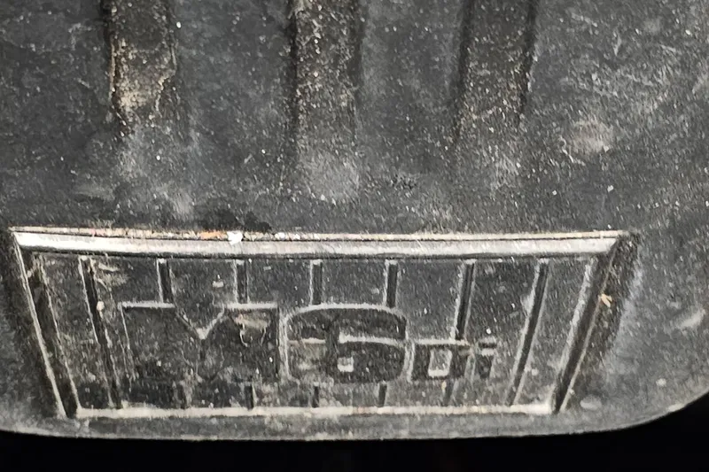 Slide: The Image of Close-up of a textured surface with "MSD" embossed, possibly a vehicle part. - 5