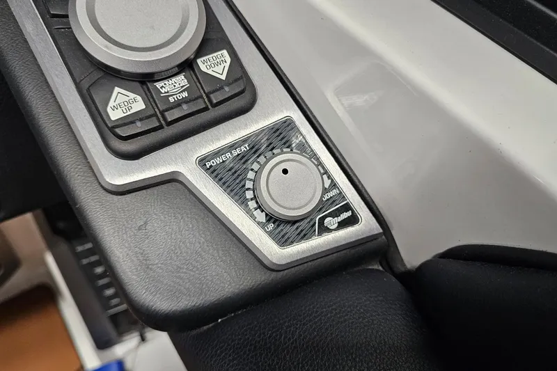 Slide: The Image of 2023 Malibu M220 power seat and control panel with adjustment buttons. - 7