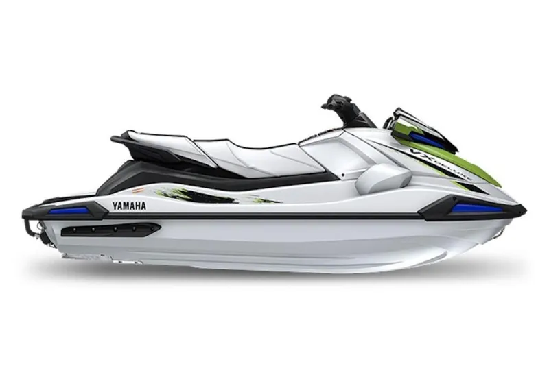 Slide: The Image of 2025 Yamaha WaveRunner VX Cruiser, sleek white and green design, side view. - 2