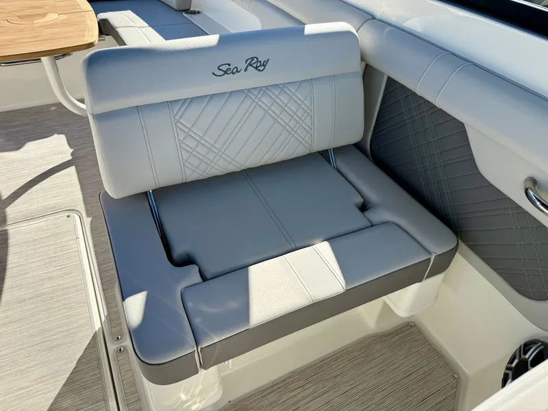 Slide: The Image of The 2026 Sea Ray SDX 290 Outboard features luxurious gray upholstery with quilted design. - 11