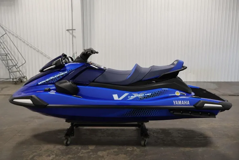Slide: The Image of 2026 Yamaha WaveRunner VX Limited HO in blue, displayed indoors on a stand. - 7