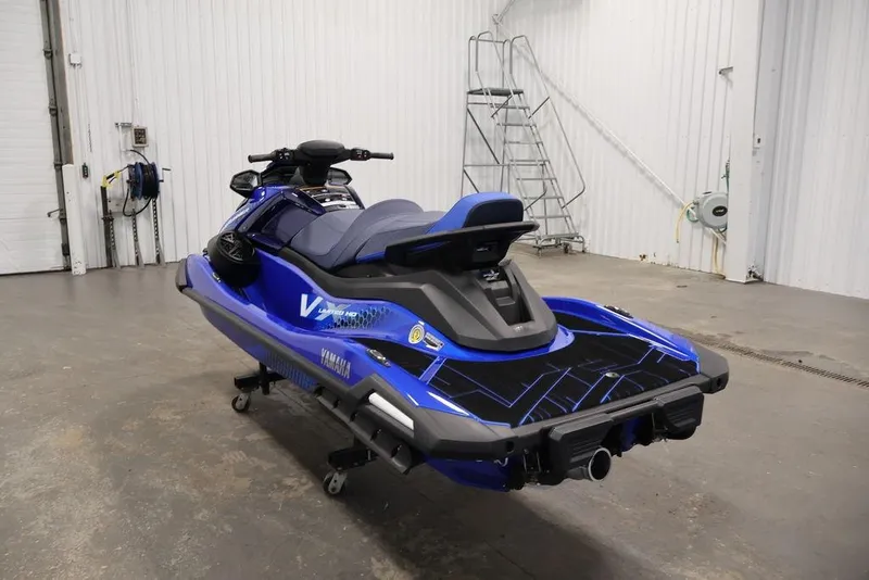 Slide: The Image of 2026 Yamaha WaveRunner VX Limited HO in a garage, showcasing sleek blue design. - 9