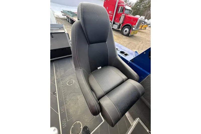Slide: The Image of 2021 Stabicraft 1850 SuperCab interior seat with black upholstery and visible stitching. - 11