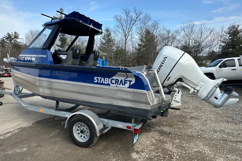 Slide: The Image of 2021 Stabicraft 1850 SuperCab boat on trailer with Honda outboard motor. - 3