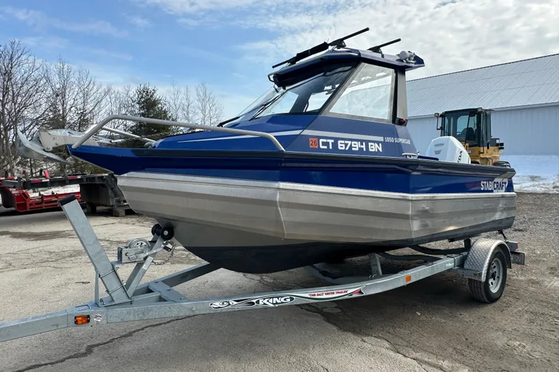 Slide: The Image of 2021 Stabicraft 1850 SuperCab boat on trailer, parked outdoors. - 5