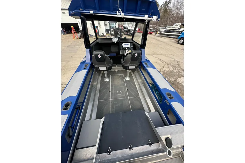 Slide: The Image of 2021 Stabicraft 1850 SuperCab interior with dual seats and open deck. - 7