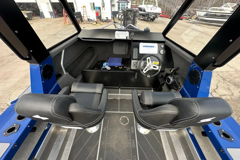 Slide: The Image of 2021 Stabicraft 1850 SuperCab interior with dual seats and navigation controls. - 8