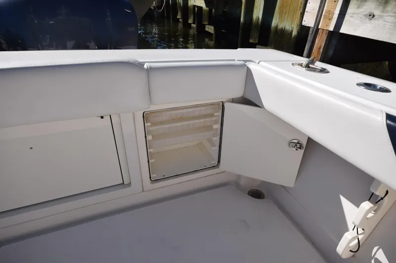 Slide: The Image of 2009 Jupiter 39 Express boat interior with open storage compartment. - 8