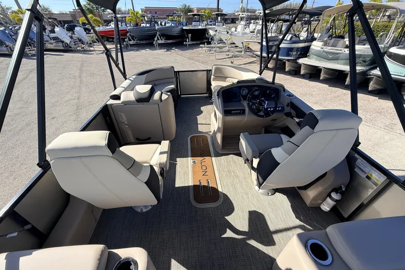 Slide: The Image of 2026 Avalon 2585 LSZ Quad Lounger Tri Toon boat interior with luxurious seating and helm. - 14
