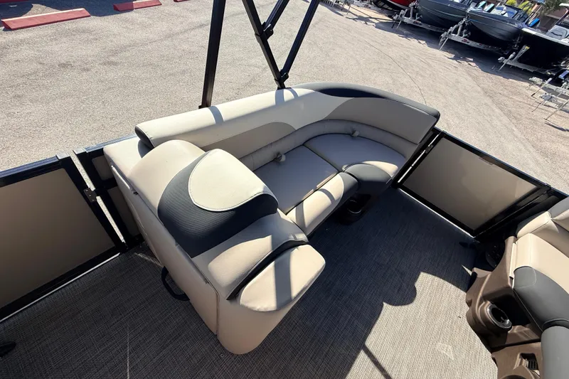 Slide: The Image of 2026 Avalon 2585 LSZ Quad Lounger interior with beige and black seating, high-performance tri-toon design. - 15