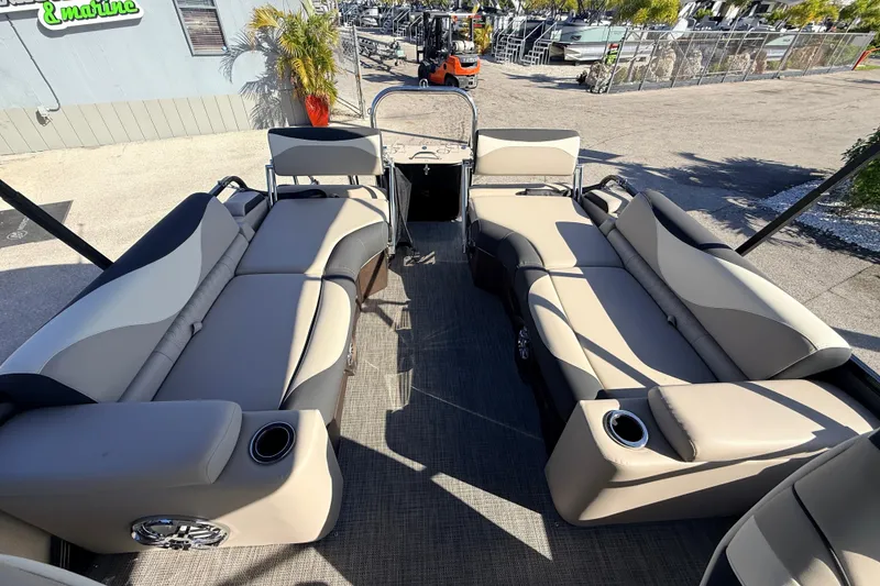 Slide: The Image of 2026 Avalon 2585 LSZ Quad Lounger interior with luxurious seating and cup holders. - 20