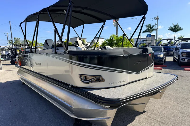 Slide: The Image of 2026 Avalon 2585 LSZ Quad Lounger Tri Toon boat with high performance features. - 5
