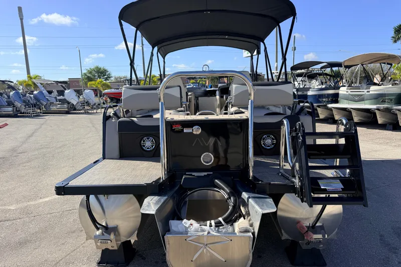 Slide: The Image of 2026 Avalon 2585 LSZ Quad Lounger Tri Toon boat, high performance, rear view. - 8