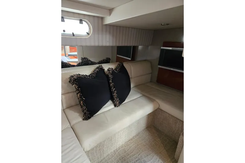 Slide: The Image of Interior of 2007 Formula 34 Performance Cruiser with plush seating and decorative pillows. - 8