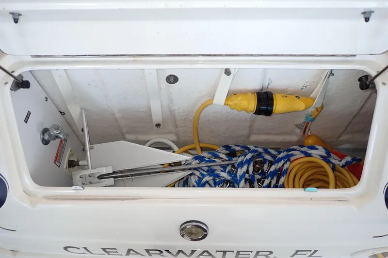 Slide: The Image of Storage compartment of 2002 Sea Ray 340 Sundancer with ropes and cables, Clearwater, FL. - 121