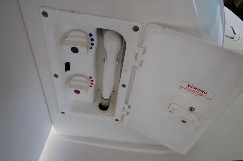 Slide: The Image of Control panel of 2002 Sea Ray 340 Sundancer boat with temperature settings. - 131