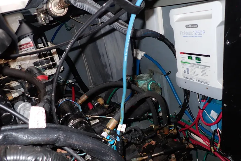 Slide: The Image of Engine compartment of 2002 Sea Ray 340 Sundancer with ProMariner ProNautic charger. - 139