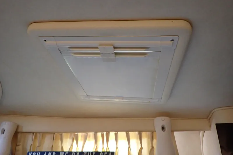 Slide: The Image of Ceiling hatch inside 2002 Sea Ray 340 Sundancer boat cabin. - 87